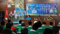 Bupati Hj Noormiliyani AS saat membuka Seminar Kepemudaan DPD KNPI Barito Kuala yang diikuti 60 peserta dari OKP GP Anshor dan Muhammadiyah, di Aula Selidah, Marabahan, Sabtu (13/08/2022).