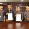 Ketua Bawaslu Kabupaten Barito Kuala, Rahmatullah Amin SHI, melakukan kesepakatan bersama (MoU) dengan Direktur LPPL Ije Jela 100 FM Hery Sasmita SSTP MAP, Selasa (13/09/2022).