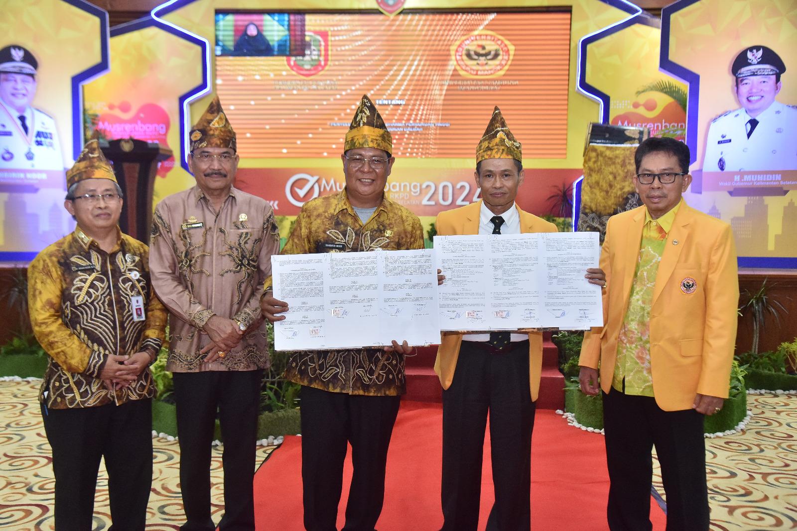 penandatanganan nota kesepahaman (MoU) dilaksanakan di Aula KH Ideham Khalid Sekretariat Daerah Provinsi Kalsel di Banjarbaru pada Kamis (13/4). Foto : Naimah Mahmudah- M. Rezky Maulidja