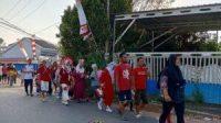 Antusias Warga De’Padis Regency Rt. 33 dalam mengikuti jalan santai. Minggu, (20/8/2023). Foto: Arsyad/lenterakalimantan.com