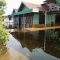 Kondisi rumah warga di Desa Bincau Muara, Kecamatan Bincau, Kabupaten Banjar terendam air. Foto: BPBD Kabupaten Banjar.