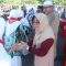 Momen Penjabat Bupati Tabalong, Hj Hamida Munawarah menyambut kedatangan jemaah haji di Tabalong. Foto: JM/lenterakalimantan.com