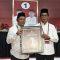Teks Foto: Abdul Hadi-Akhmad Fauzi, berhasil mengalahkan kotak kosong di Pilkada Balangan 2024 Sumber Foto: (Windi/lenterakalimantan.com