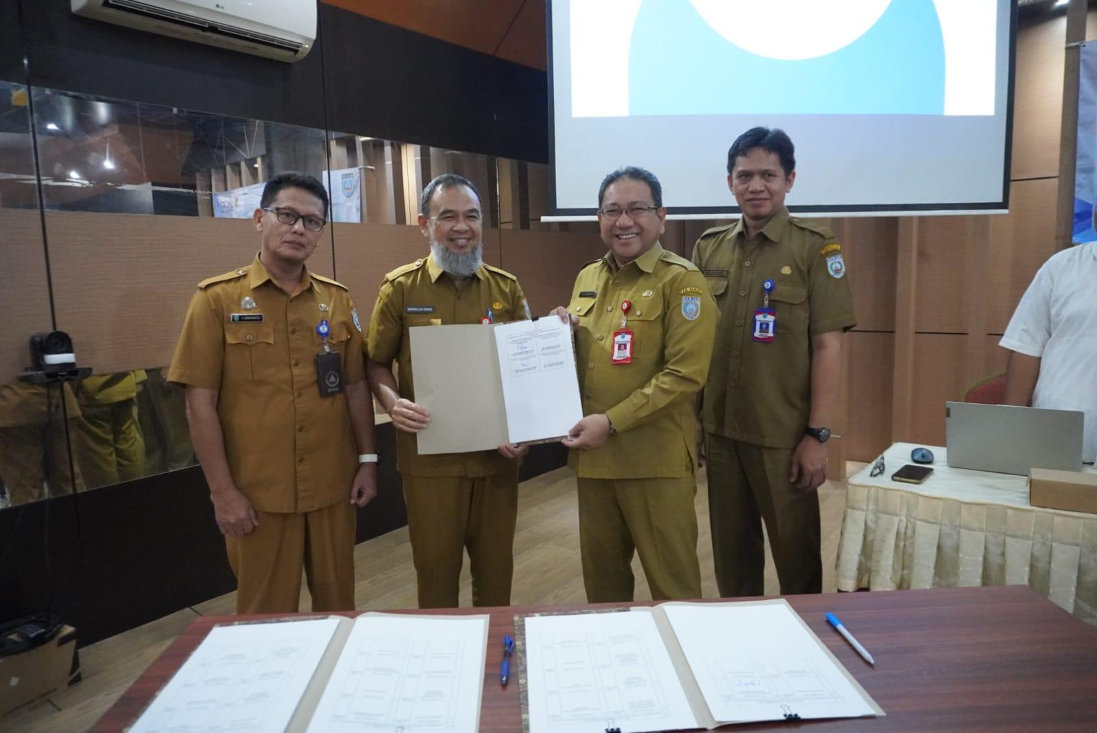 Sekda Banjar HM Hilman saat membuka Forum Satu Data tingkat Kabupaten Banjar tahun 2024, di Aula Baiman Kantor Bappedalitbang, Martapura, Selasa (24/12/2024) pagi. Foto: Pemkab Banjar