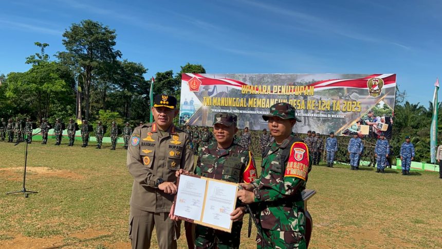 Kegiatan penutupan TMMD ke-124 ( dok foto Arsyad LK)