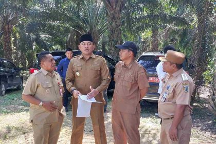 Bupati Tala Rahmat Trianto dan jajaran, meninjau kandidat lokasi Pemekaran Kecamatan ( dok Prokopim Tala//Asep LK )