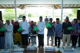 Wabup Kapuas Launching Penyaluran Bantuan Pangan Beras dan Minyak Goreng