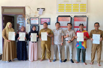 Kantor Pertanahan Tapin Serahkan Sertipikat PTSL kepada Warga Desa Pandahan